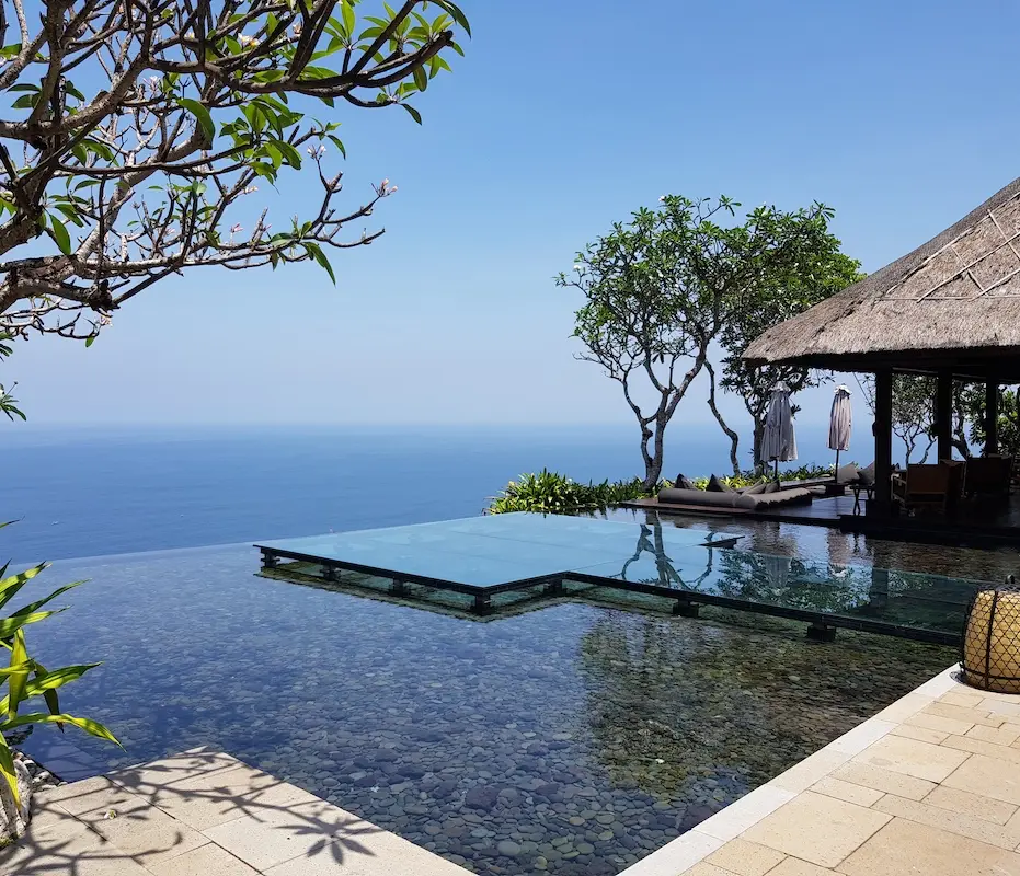 Opulent Bvlgari Resort Bali View of ocean over infinity pool edge from luxury Bvlgari Resort in Bali