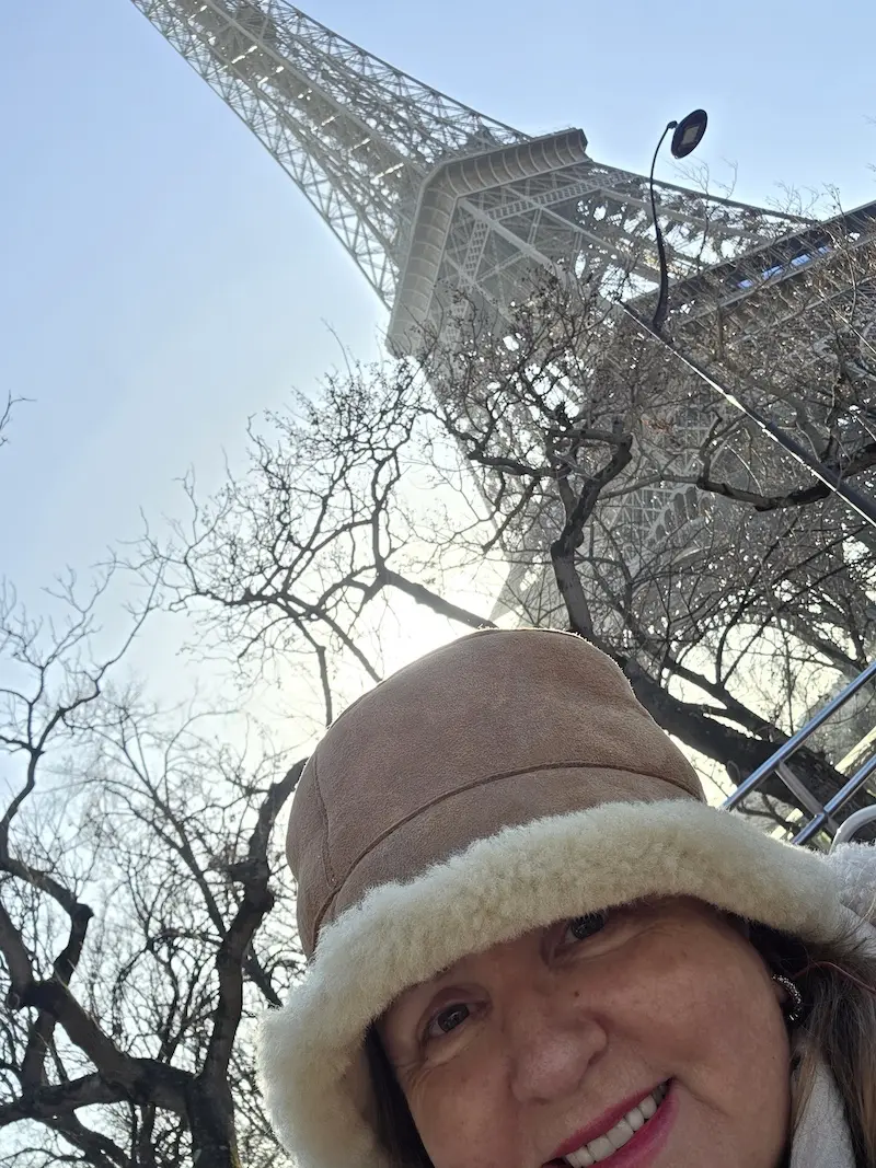 Enjoy Eiffel Tower in Paris all year round Eiffel Tower in Paris behind Sandra Skelton